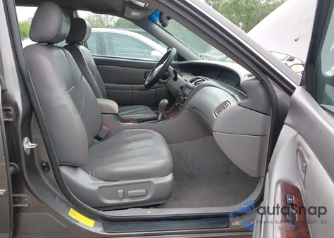 2003 Toyota Avalon Xl z USA, uszkodzony, nr VIN 4T1BF28B53U285411